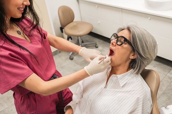 Implant Supported Dentures Guide: Process, Benefits, And Care